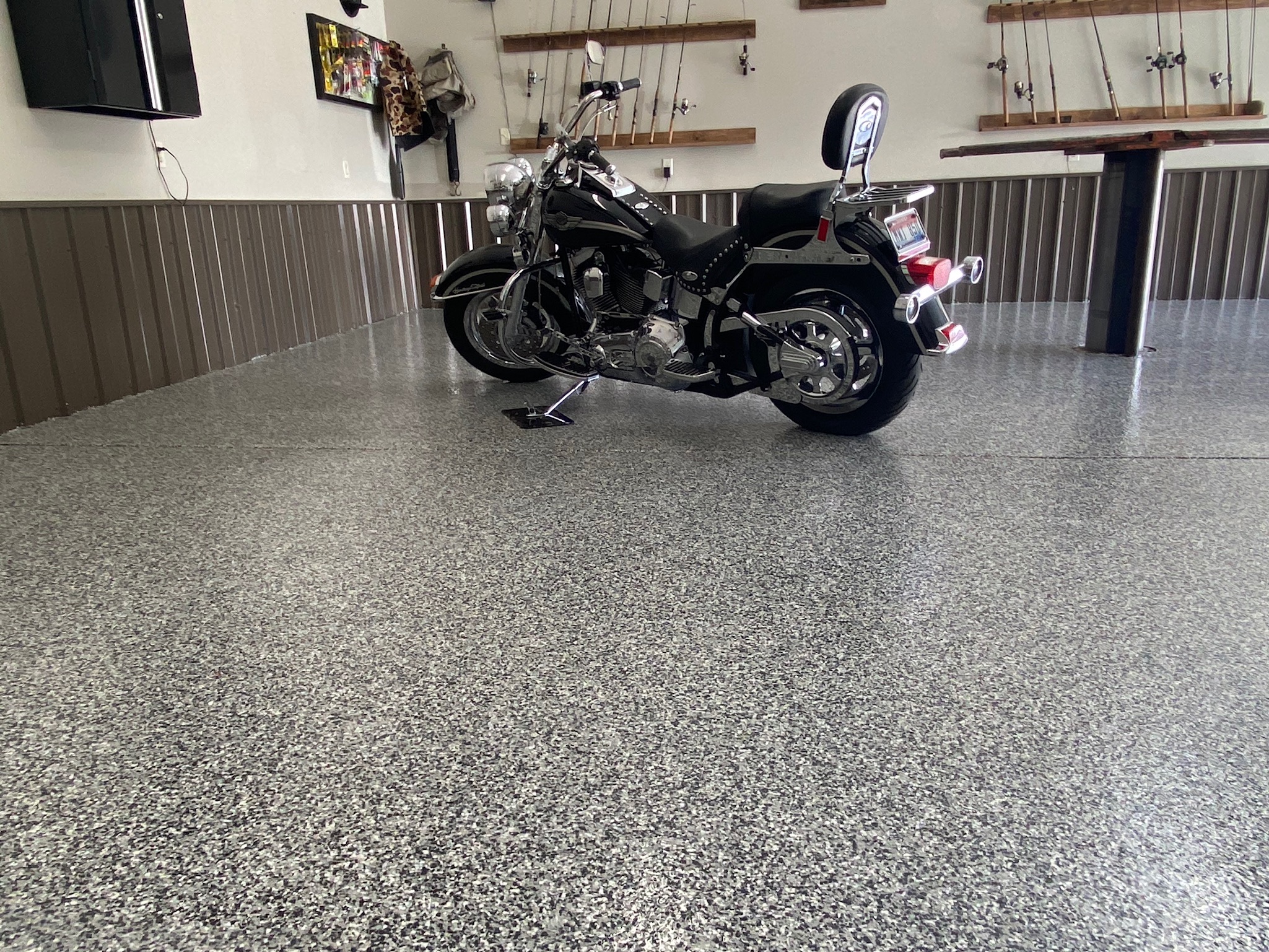 Harley Davidson motorcycle on gray and white flake floor coating